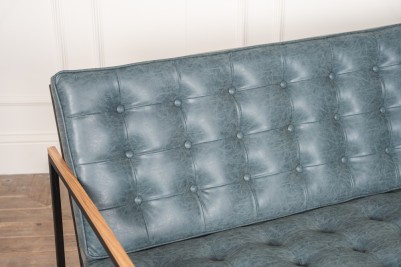 worn denim upholstered sofa